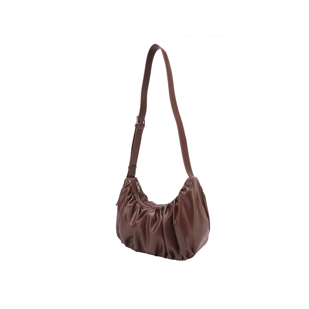 Chara | Croissant-shaped leather sling bag