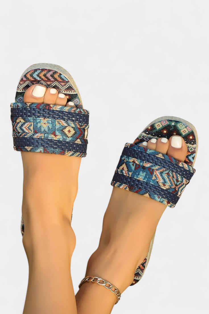 Dorotea Flat sandals with double strap and ethnic woven sole