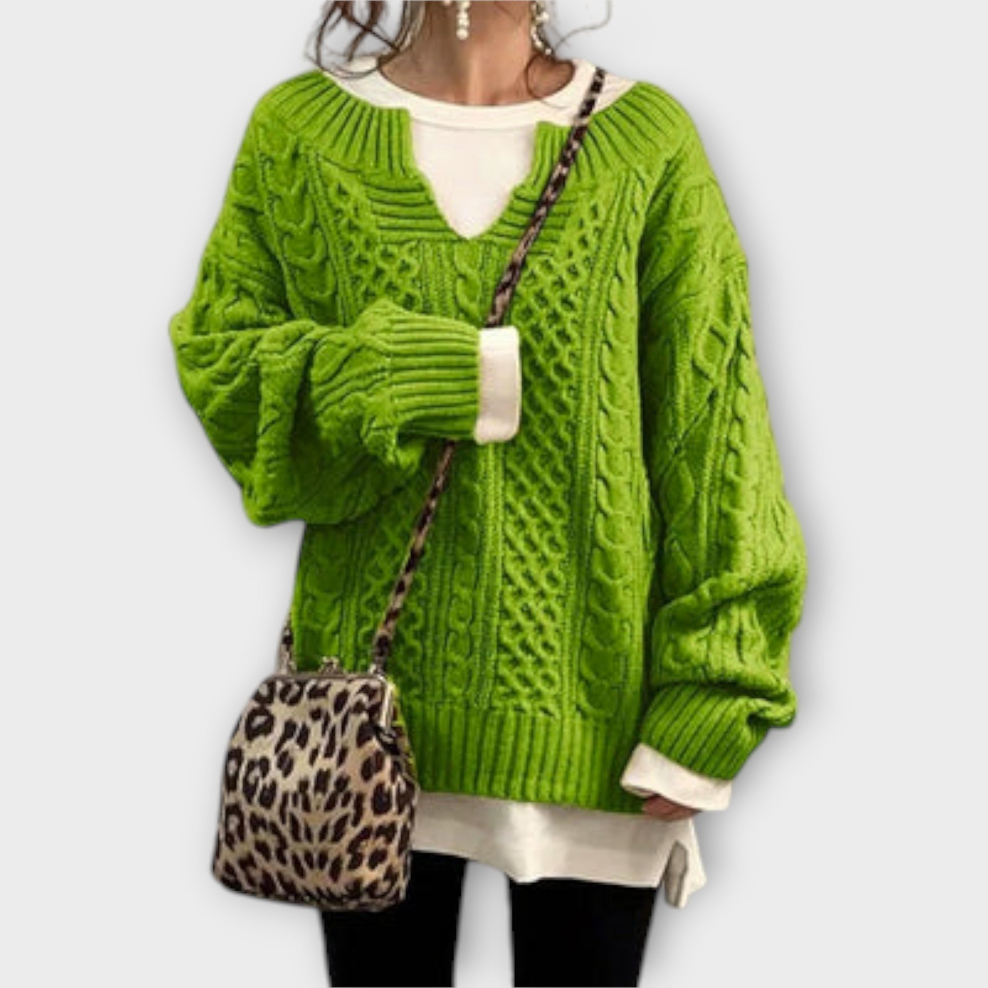Extra large knitted sweater with braid pattern