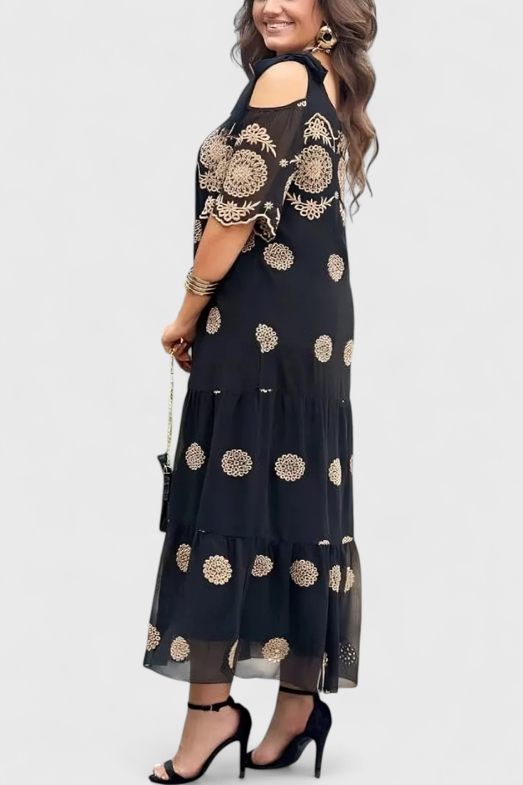 Cathy Elegant Summer Dress in Net with Openings and a Flowing Line